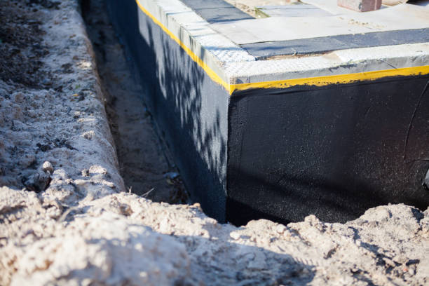Professional Basement Waterproofing technician working in Bel Alton, MD